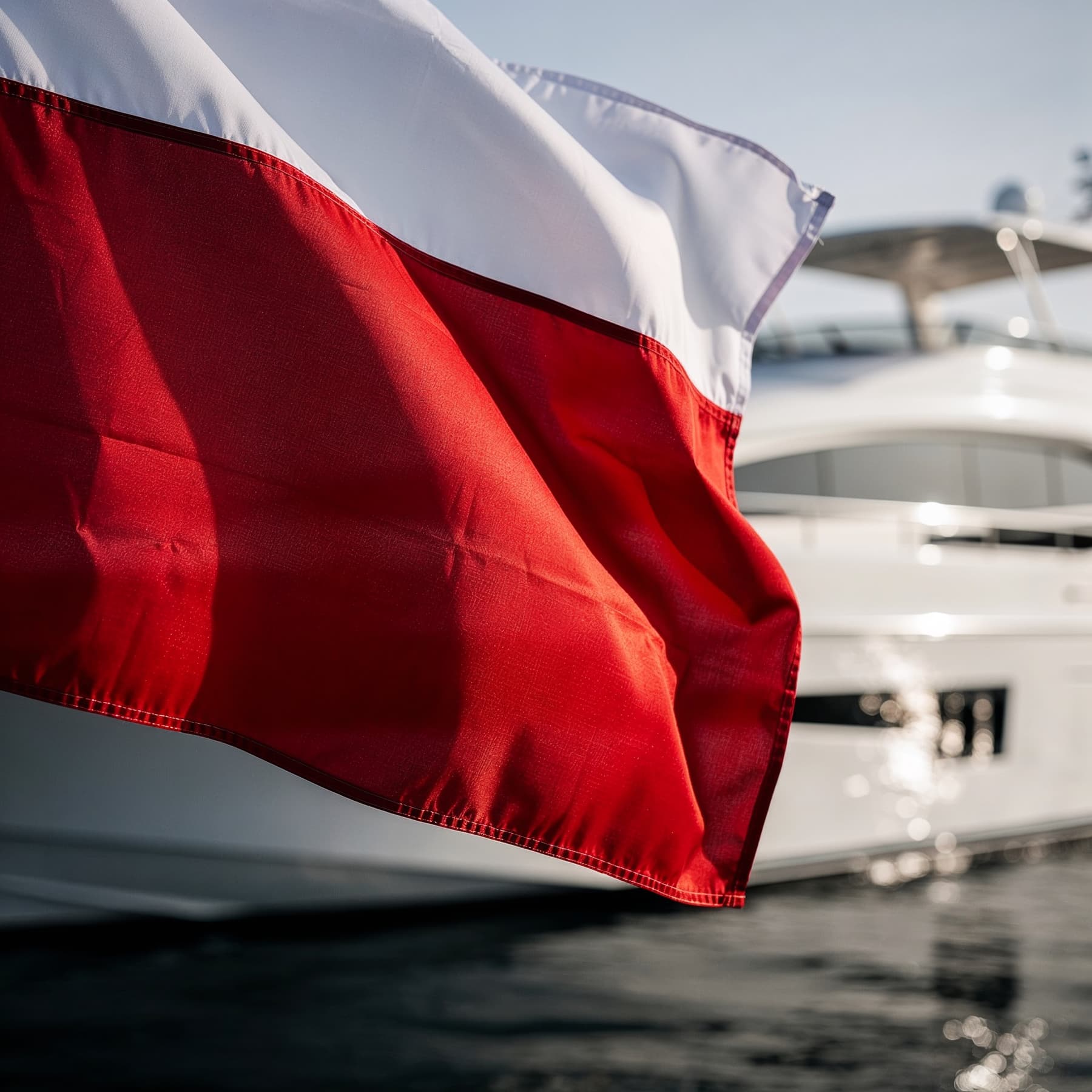 Yacht with Polish flag in Gdansk harbor